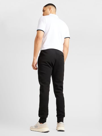 Tapered Pantaloni di Hackett London in nero