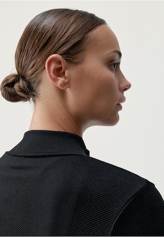 Born Living Yoga Tussenjas 'Gita' in Zwart