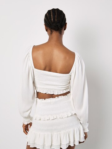 Haut Apricot en blanc