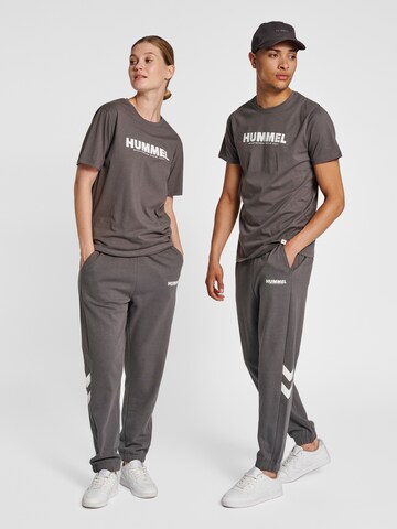 Effilé Pantalon de sport Hummel en noir