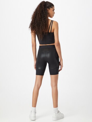 ASICS Skinny Sportovní kalhoty 'Fujitrail Sprinter' – černá