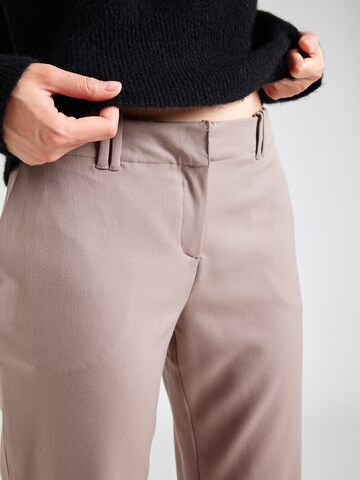 Bootcut Pantaloni di Monki in beige