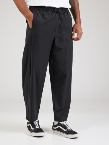 Loosefit Pantalon Champion Authentic Athletic Apparel en noir : devant