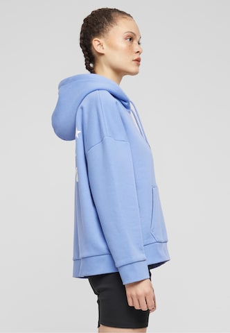 Sweat-shirt Karl Kani en bleu