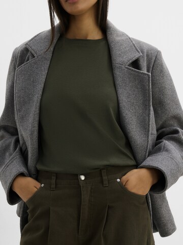 Barrel Pantaloni con pieghe di bonprix in verde