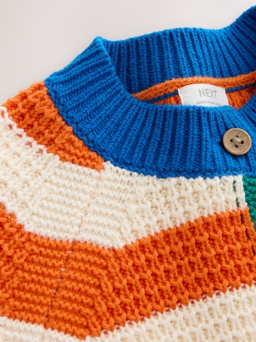 Cardigan Next en orange