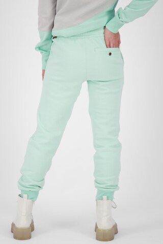 Tapered Pantaloni 'MonalieAK' de la Alife and Kickin pe verde