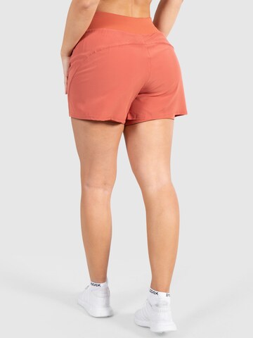 Smilodox Loosefit Sportbroek 'Advance Pro' in Oranje
