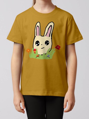 T-Shirt 'Osterhase Mit Blumen' watabout.kids en jaune