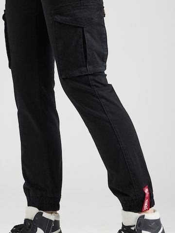 ALPHA INDUSTRIES Tapered Cargo trousers in Black