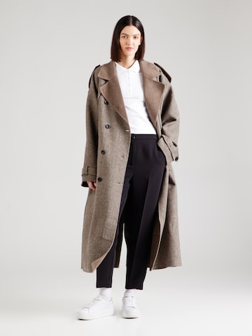 Slimfit Pantaloni con piega frontale di TOMMY HILFIGER in nero
