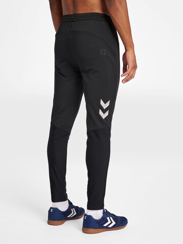 Coupe slim Pantalon de sport Hummel en noir