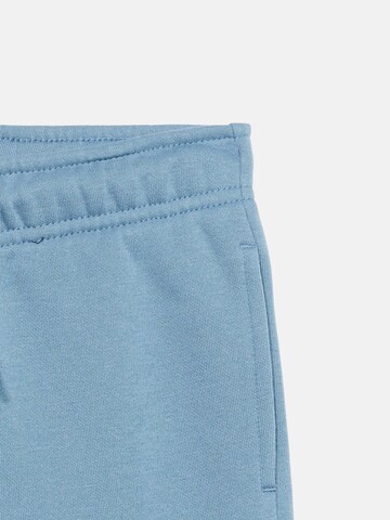 Champion Authentic Athletic Apparel Tapered Hose in Blau