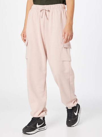 Nike Sportswear - Tapered Calças cargo em rosa: frente