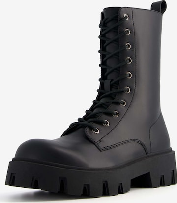 Bershka Lace-Up Boots in Black: front