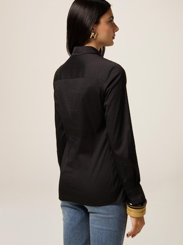 oltre Bluse‌‌‌‌‌‌‌‌‌ in Schwarz