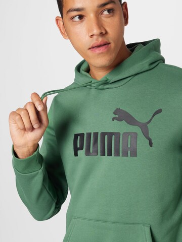 PUMA Спортивный свитшот 'ESSENTIAL' в Зеленый