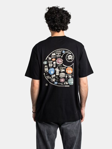 Carhartt WIP T-Shirt 'Catalogue' in Schwarz: Vorderseite