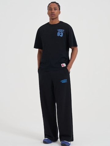 AND1 Široke hlačnice Hlače | črna barva