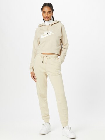 Effilé Pantalon Nike Sportswear en beige