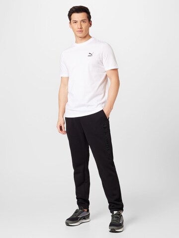 Champion Authentic Athletic Apparel Tapered Hose in Schwarz