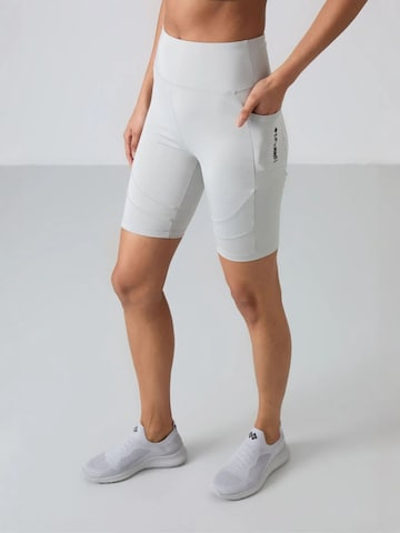 Tommy Life - Tapered Leggings 'Gamaschen' em castanho