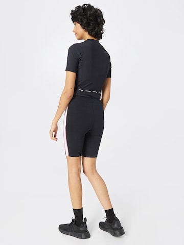 Skinny Pantalon de sport 'Rene' ELLESSE en noir