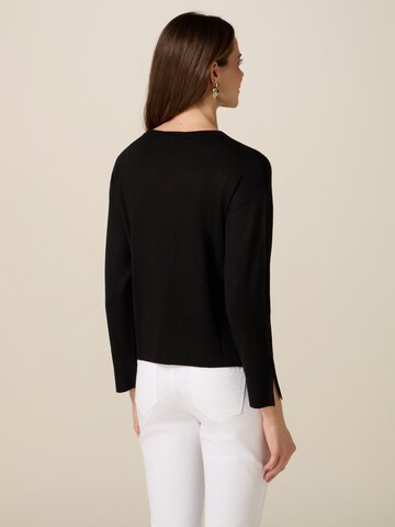 Pullover di oltre in nero