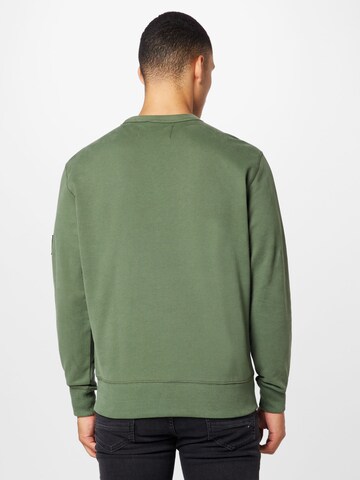 Bluză de molton de la Calvin Klein Jeans pe verde