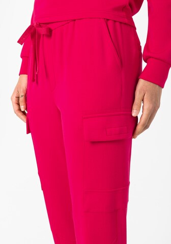 TIMEZONE Ozke Kargo hlače 'Rakima' | roza barva