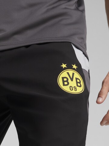 PUMA Zwężany krój Spodnie sportowe 'BVB' w kolorze czarny
