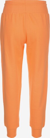 Effilé Pantalon de sport new balance en orange