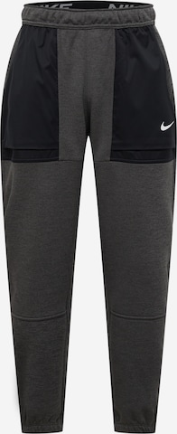 NIKE Workout Pants in Grey: front