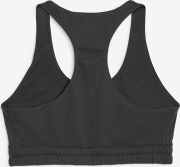 PUMA Bustier Sport bh in Zwart