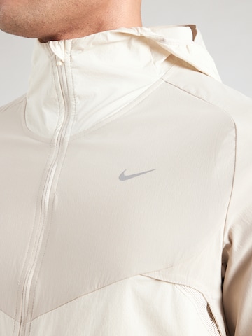 NIKE Træningsjakke 'NK' i beige