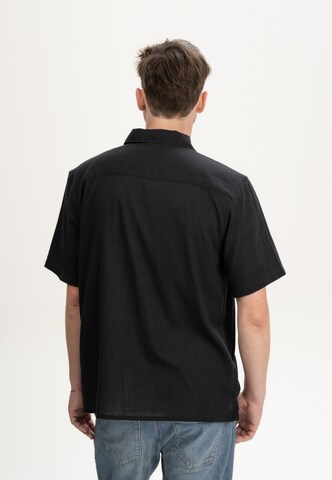MELA - Ajuste regular Camisa 'Vivek' en negro