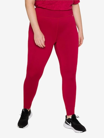 SHEEGO Skinny Workout Pants in Red: front