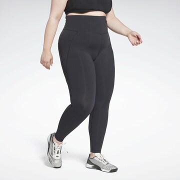 Reebok Skinny Sports trousers in Black: front