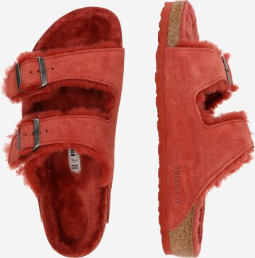 BIRKENSTOCK Pistokkaat 'Arizona Shearling' värissä punainen