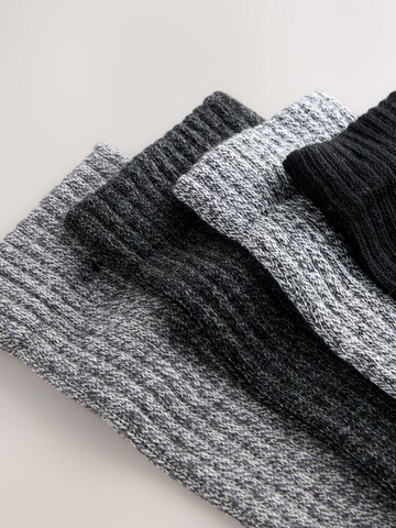 Next Zokni - szürke