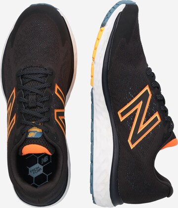 Chaussure de course new balance en noir