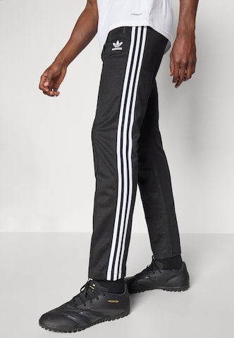 ADIDAS ORIGINALS Slimfit Nadrág 'Adicolor Classics Beckenbauer' - fekete