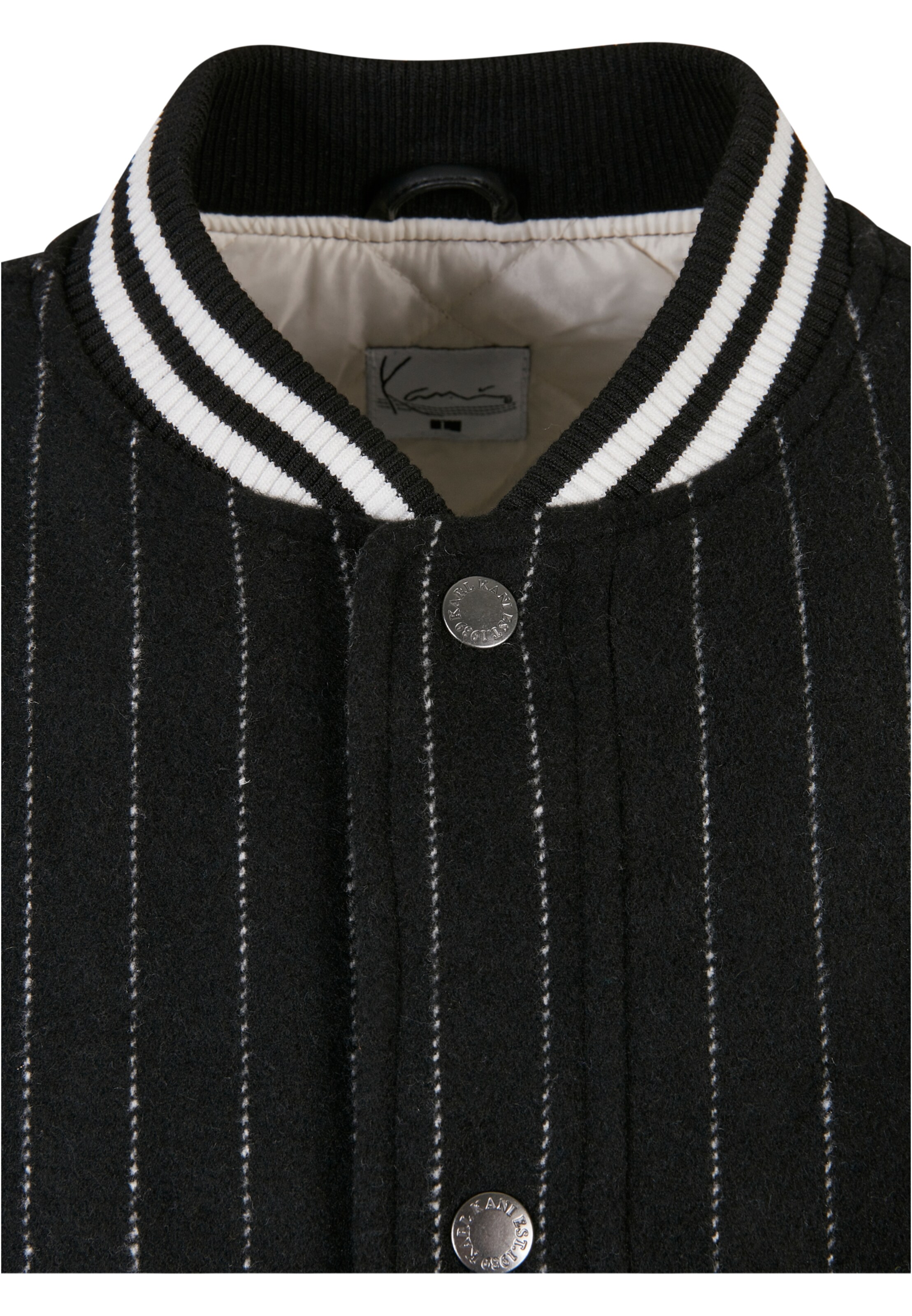 melns Karl Kani Starpsezonu jaka 'KM222-023-1'