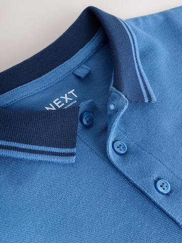 T-Shirt Next en bleu