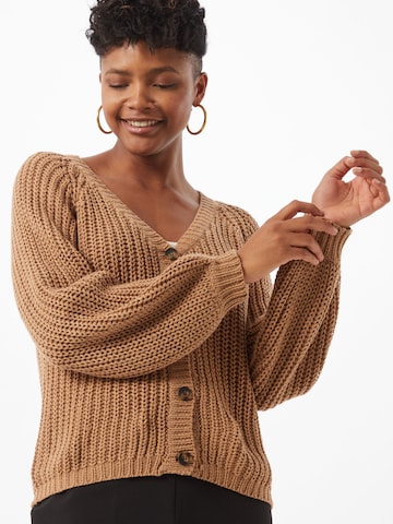 Moves Knit Cardigan in Brown: front