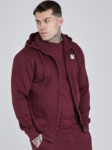 Veste de survêtement SikSilk en rouge : devant