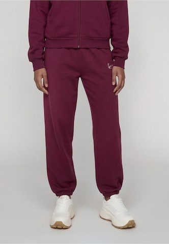 Effilé Pantalon 'Essential' Karl Kani en violet : devant