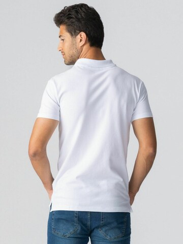 Coupe regular Chemise ' Muscle Polo ' TEESHOPPEN en blanc