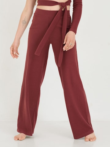 ABOUT YOU x Sofia Tsakiridou Wide leg Trousers 'Leni' in Brown