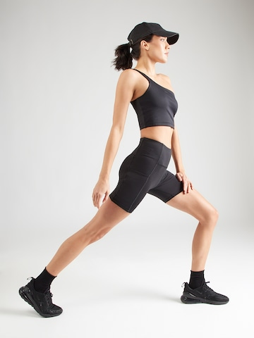 Skinny Pantaloni sportivi di Reebok in nero
